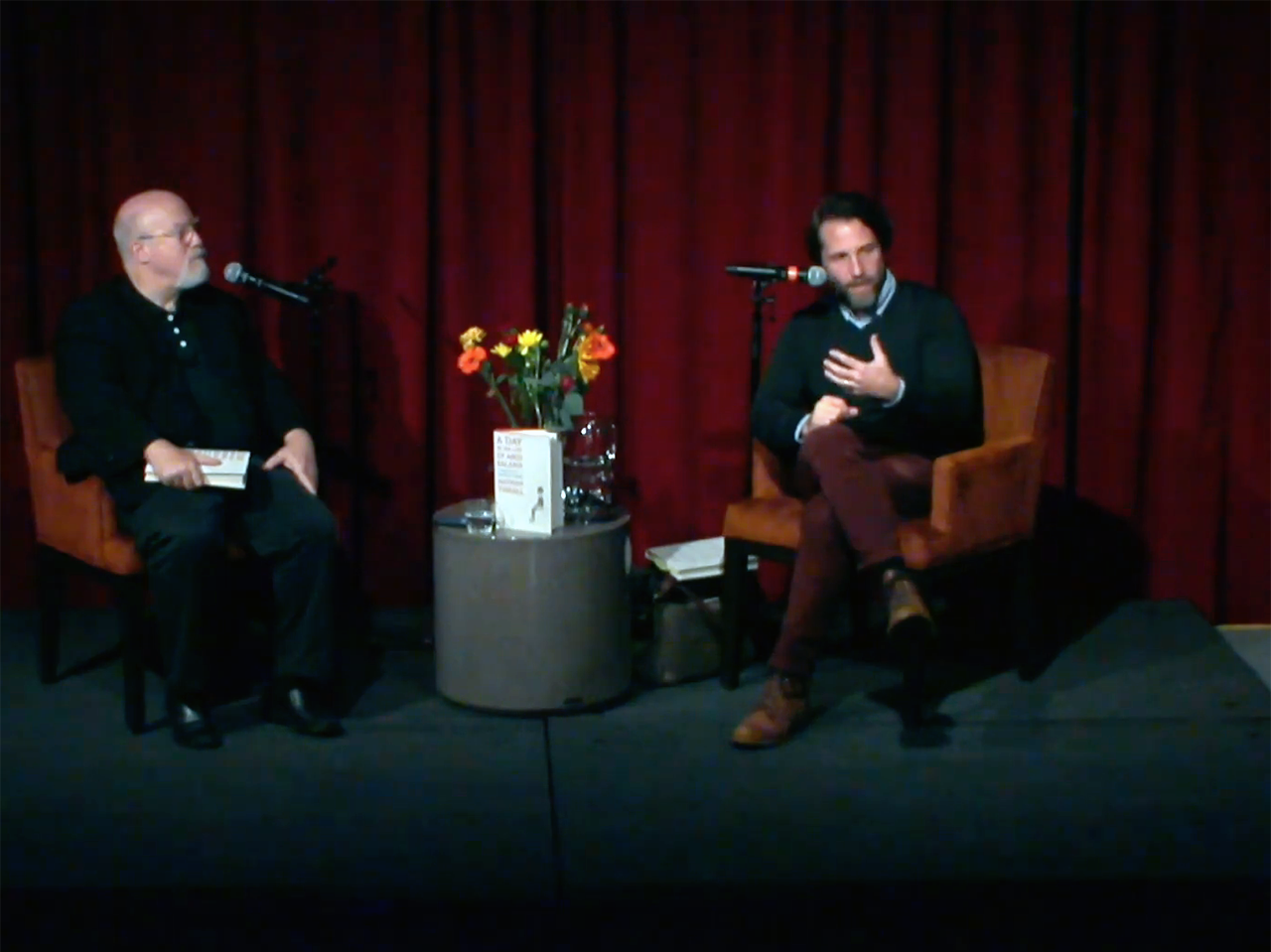 Nathan Thrall (right) discusses his book, "A Day in the Life of Abed Salama," with moderator Mark Danner at the JCCSF on Oct. 30, 2023. (Photo/Screenshot)